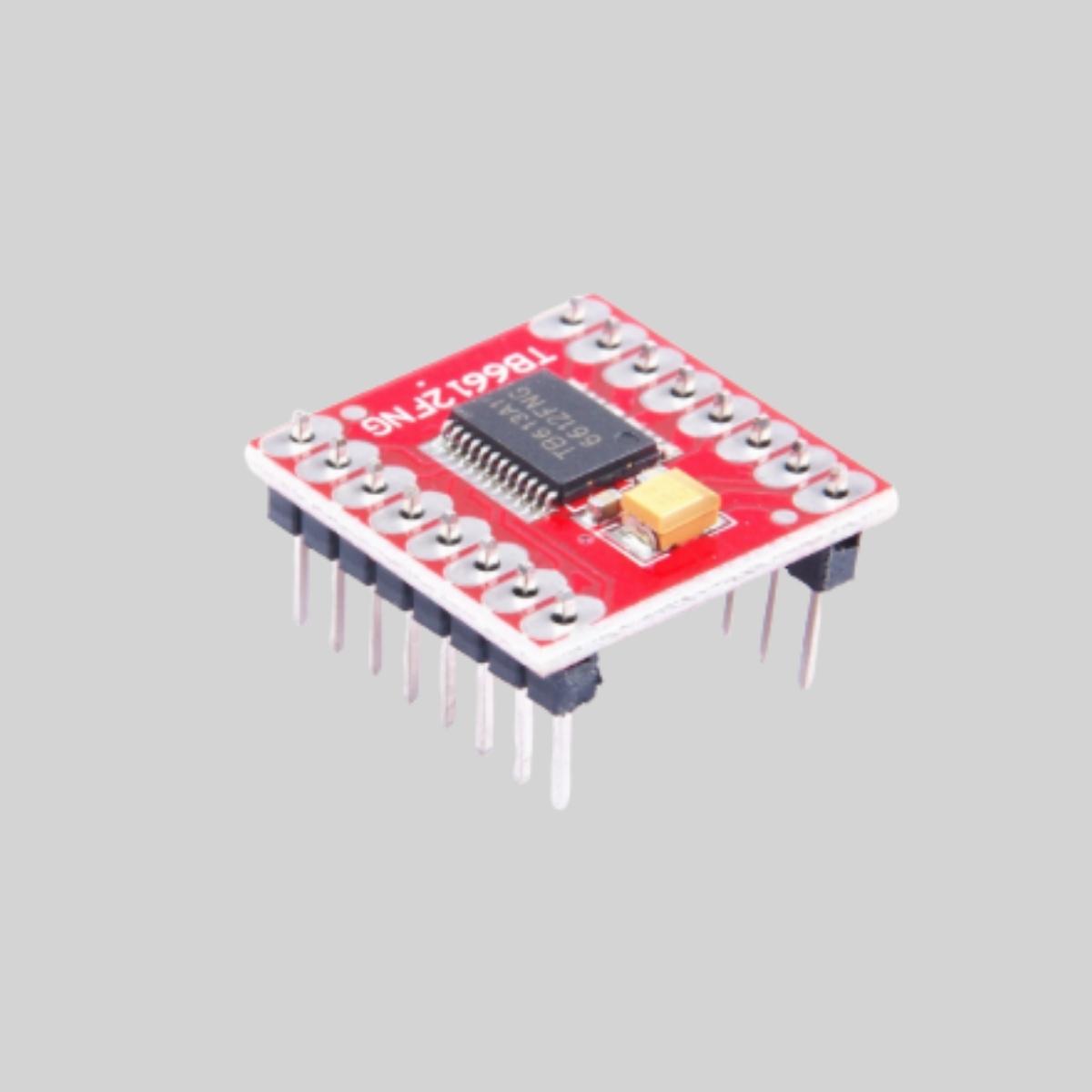 Top-down view of the compact red TB6612FNG Dual Motor Driver Module.