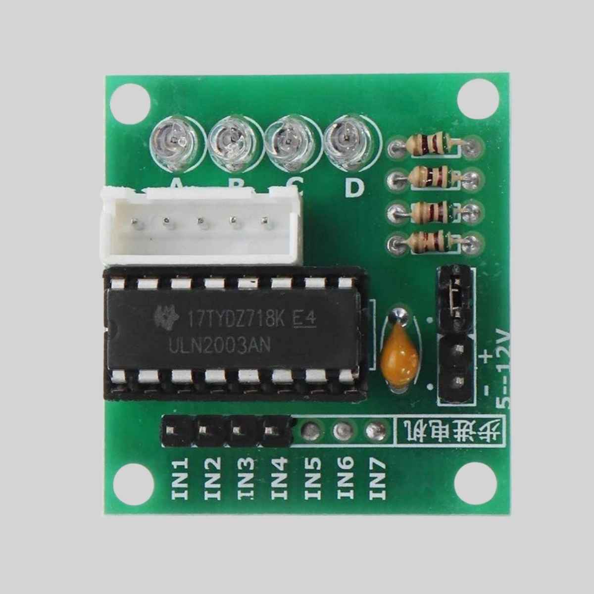 Close-up of the ULN2003 DIP driver board showing the four LED status indicators and motor connector.